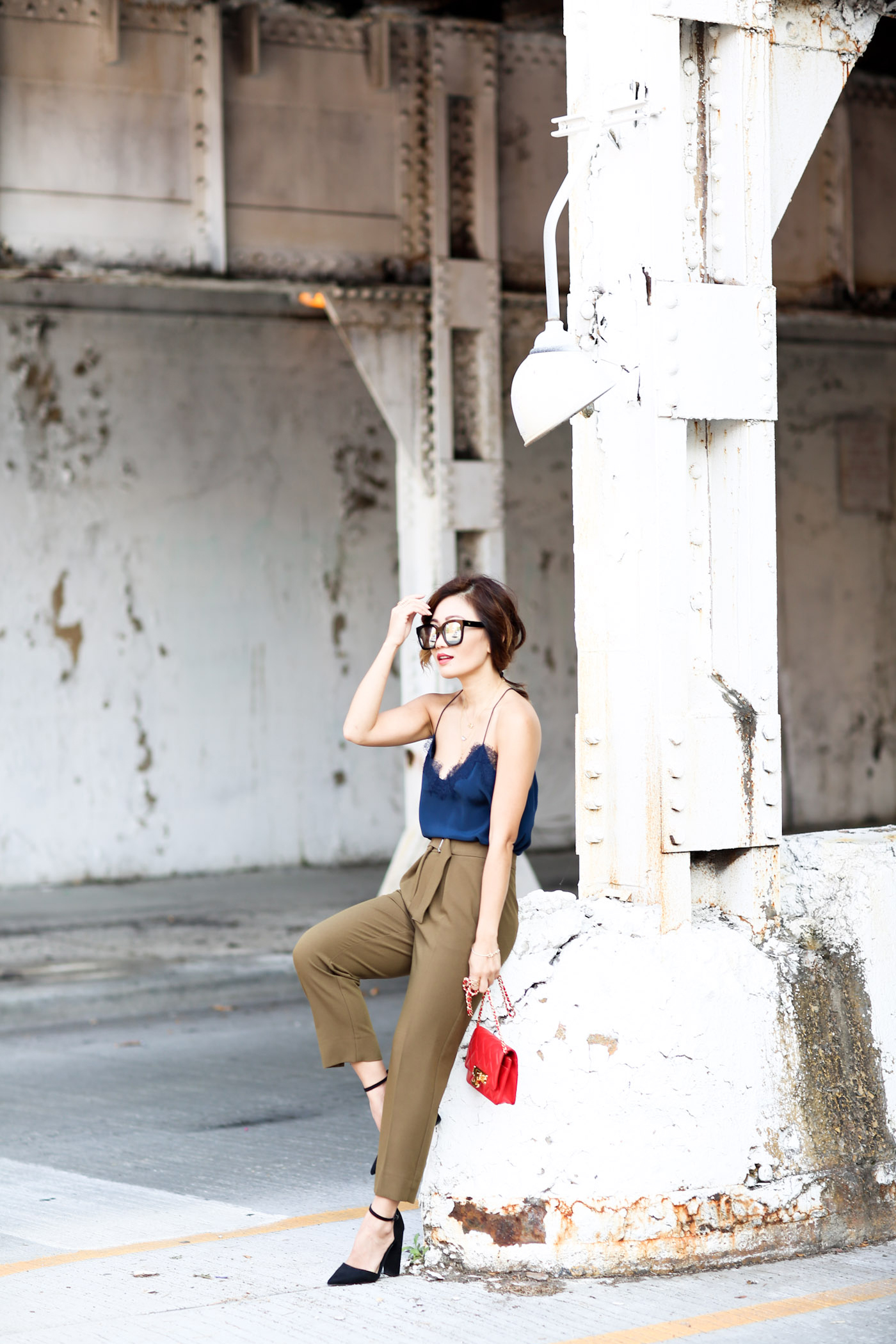 tucked lace cami with tapered trousers