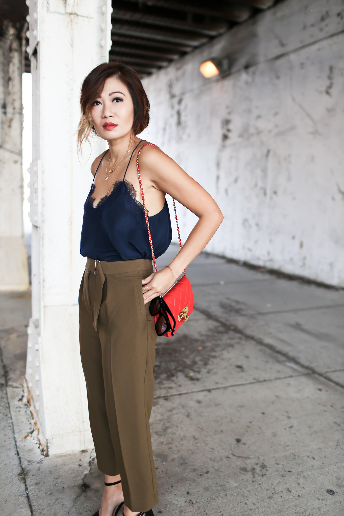 tucked lace cami with tapered trousers