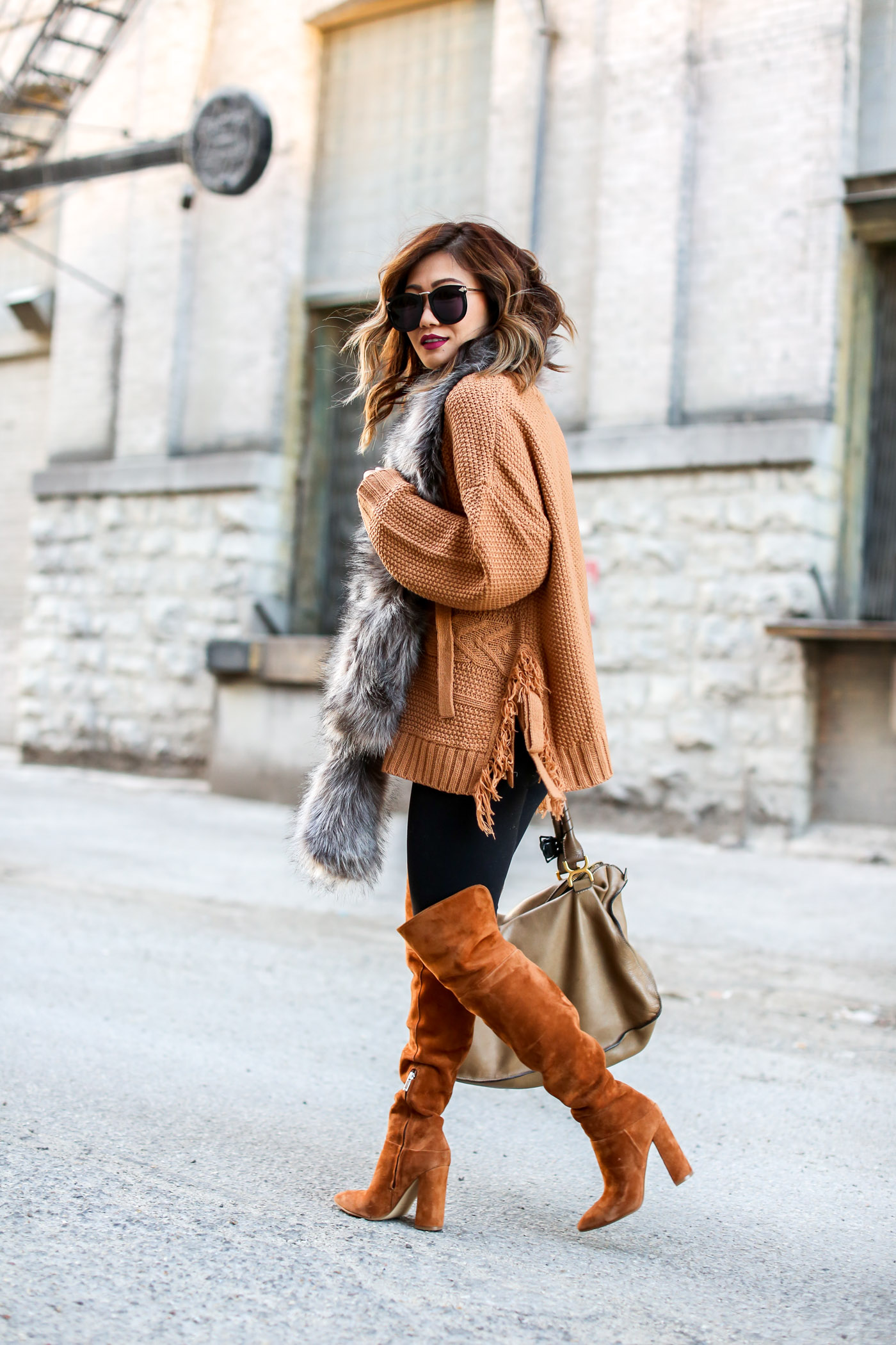 asos camel lace up sweater and faux fur shawl with over the knee marc fisher boots