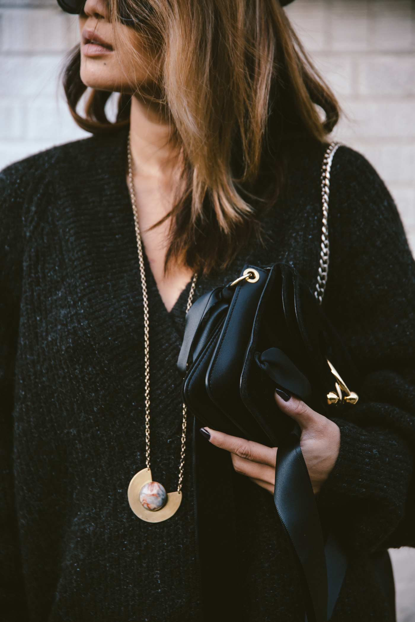 oversized sweater dress with christian louboutin ankle boots and leg warmers newsboy cap and jw anderson bow pierce bag